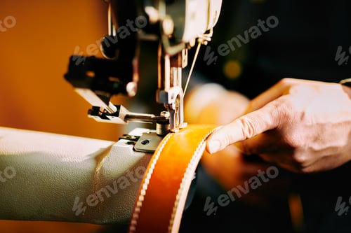 Preview: Close up of sewing process of the leather belt