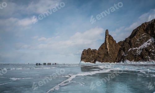 Preview: scenic view of frozen river with snowy mountains in winter, Russia, Lake Baikal, march 2016