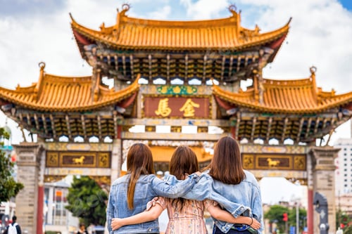 Preview: back side of Three asian happiness women walking and sightseeing together when travelling