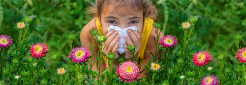 Preview: The child is seasonal allergy to flowers. Selective focus.