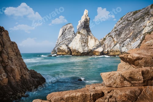 Preview: Ursa beach, Sintra, Portugal. Epic seascape of cliffs towering up from emerald green atlantic ocean