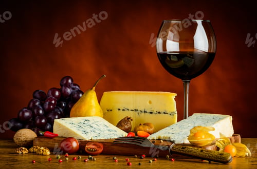 Preview: Cheese, Fruits, and Red Wine on Wooden Table