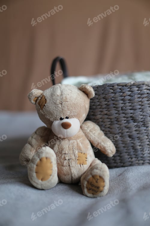 Preview: Soft lovely teddy bear with basket and bokeh