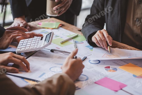 Preview: Business Team Analyzes Data and Financial Documents