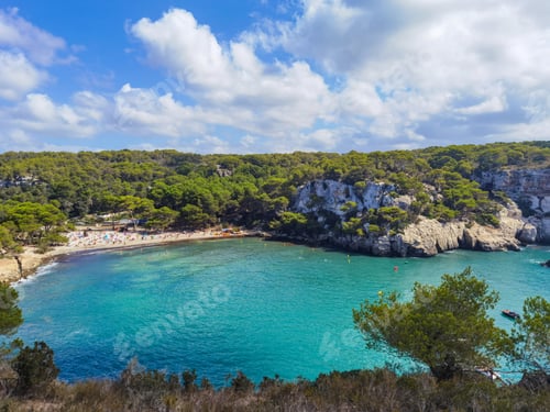 Preview: View from above of a small beach, turquoise emerald sea, summer, travel, vacation, tourists, Menorca