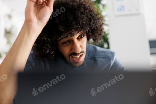 Preview: Concentrated executive manager solving complex business task on laptop