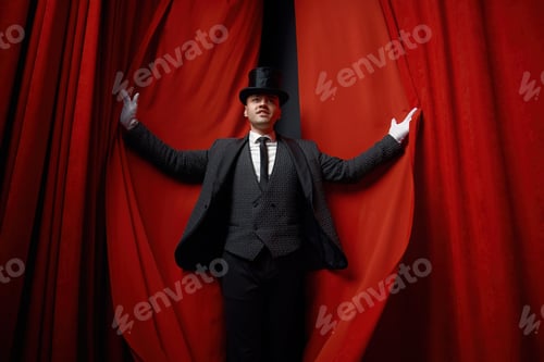 Preview: Cinematic posed portrait of magician actor over red velvet stage curtain