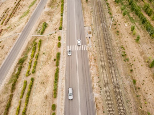 Preview: aerial top view of crosswalk on a countryside fast speed road f
