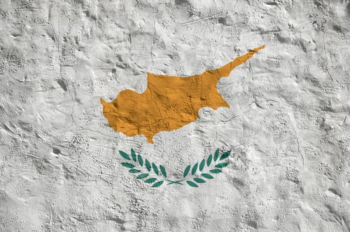 Preview: Cyprus flag depicted in bright paint colors on old relief plastering wall close up