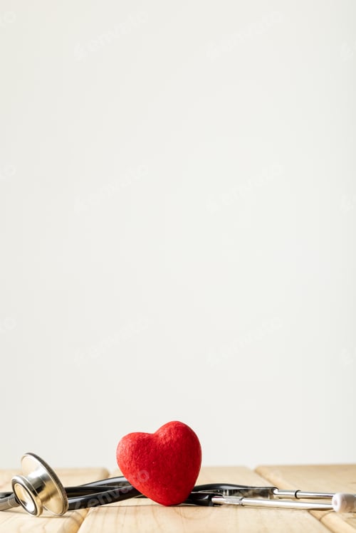 Preview: Vertical composition of stethoscope and red heart on white background with copy space
