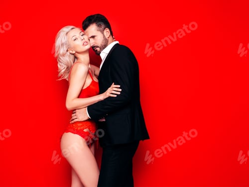 Preview: Beautiful woman and handsome man in studio