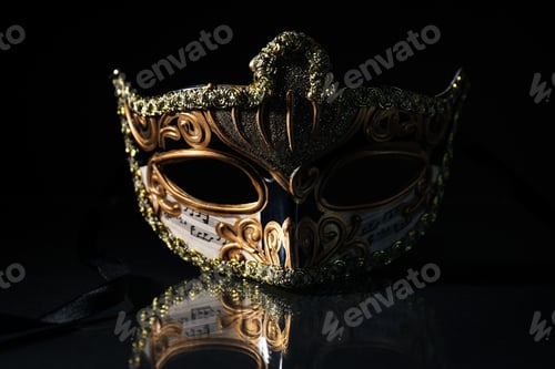 Preview: Decorated carnival mask on dark background, close up