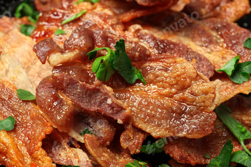 Preview: Tasty breakfast and delicious meat food concept - fried bacon
