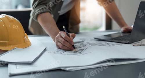 Preview: engineer man working in office with blueprints.Engineer inspect architectural plan, sketching a