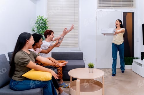 Preview: Friends Enjoying a Surprise Gift in Living Room