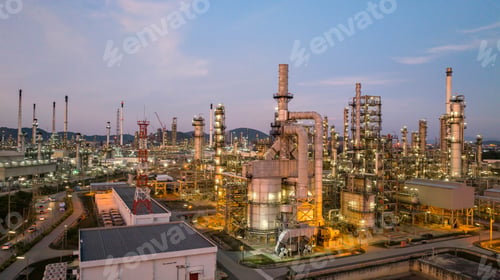 Preview: Oil and gas industrial refinery at twilight, Oil refinery and Petrochemical plant pipeline steel.