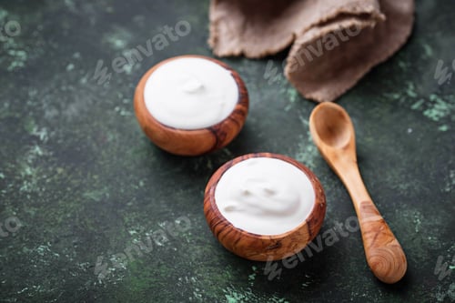 Preview: White Greek yogurt in wooden bowl