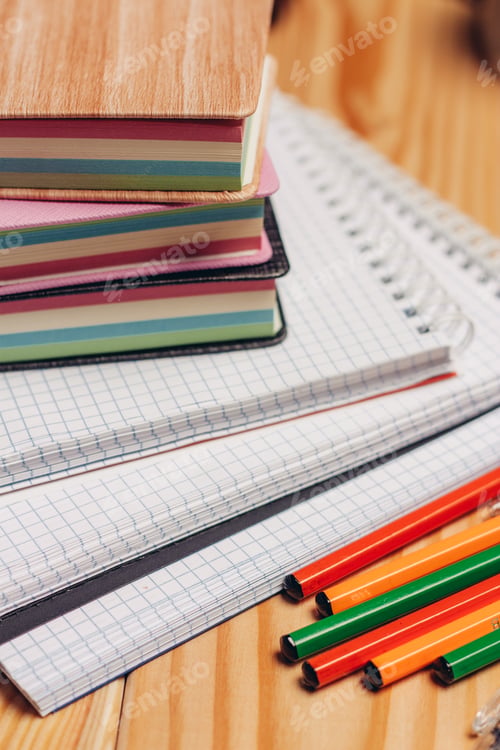 Preview: colorful stickers notepads pencils office desk close-up