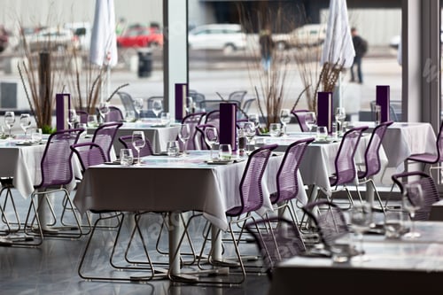 Preview: Indoor restaurant tables ready for service