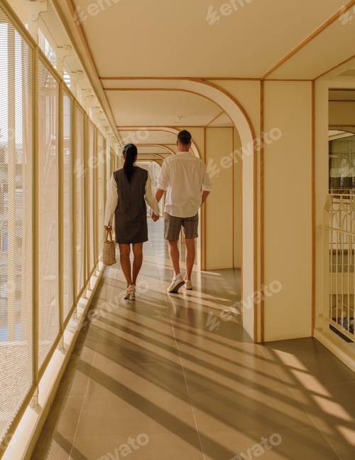 Preview: Couple on vacation at an art deco luxury hotel architecture from the 80s