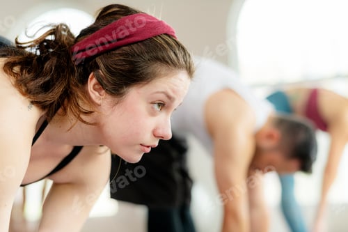 Preview: Woman Participates in Exercise Class with Other Adults