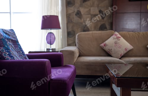 Preview: Living room interior with cozy sofas and window.