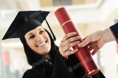 Preview: Young Female Graduating And Receiving Diploma At University