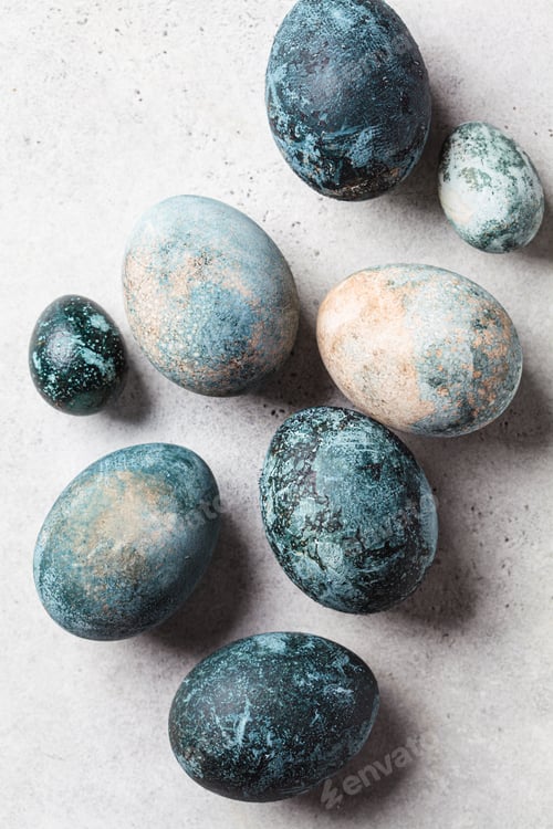 Preview: Easter eggs painted in trendy denim blue, gray background.