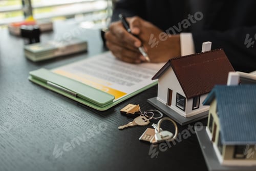 a real estate agent is explaining the details of a home purchase contract to a buyer