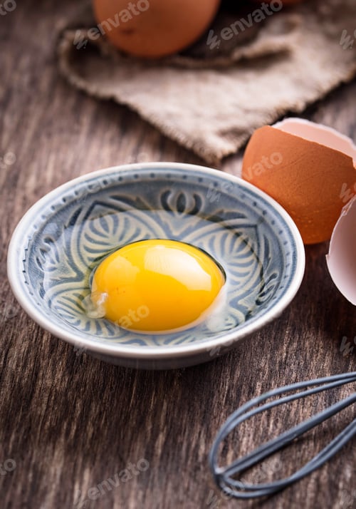 Preview: Raw chicken eggs and whisk