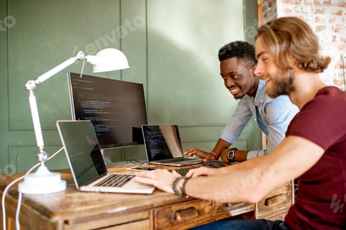 Preview: Programmers working with program code