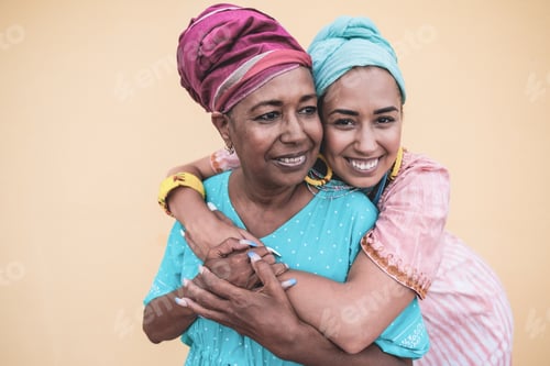 Preview: Happy african girl hugging her mother - Family, mother and adult child love