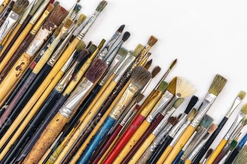 Preview: Many brushes for painting on a white background, top view.