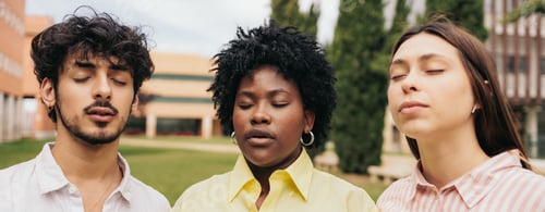 Preview: Close-up view of three gen z people with closed-eyes. Ethnicity, diversity, equality.