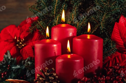 Preview: Red candles in advent wreath decoration on wooden dark background