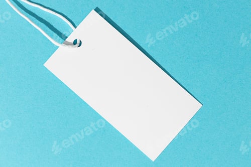 Preview: Blank white price tag isolated on blue background