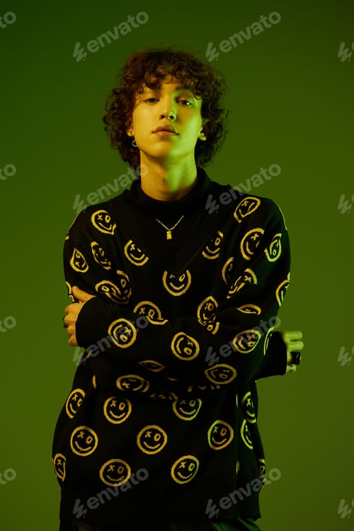 Preview: Man fashion and style accessories model with curly hair stylish sweater, hipster teen lifestyle