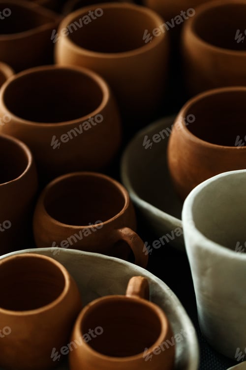 Preview: Handmade ceramic cups top view. Designer ceramic plates, bowls, cups and jugs