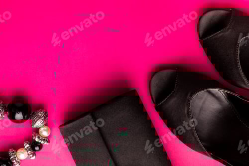 Preview: Black Clutch and Heels on Bright Pink Background