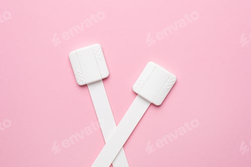 Preview: Universal lock strap for drawer on pink phoneb protection from children on pink background