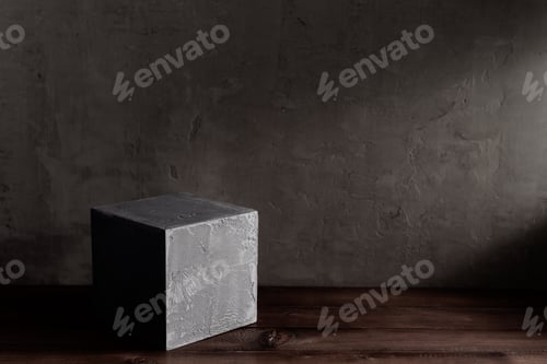 Preview: Concrete cube or brick near wall background texture. Abstract art or construction concept