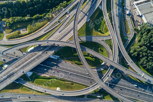 Preview: Complex junction and cars traffic. Aerial vertical shot.