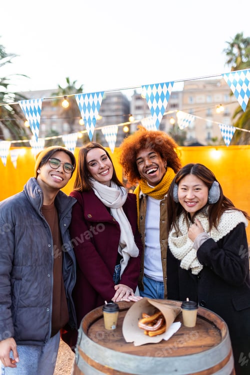 Preview: Young group of student friends enjoying time together on winter