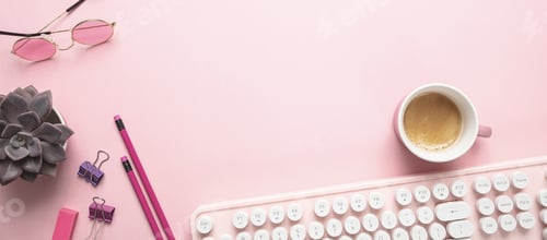 Preview: Computer keyboard and succulent plant against pink background