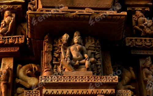 Preview: Stone carving bas relief sculptures on Khajuraho Temple, India.