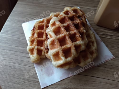 Preview: Fresh Waffles Served on a White Napkin