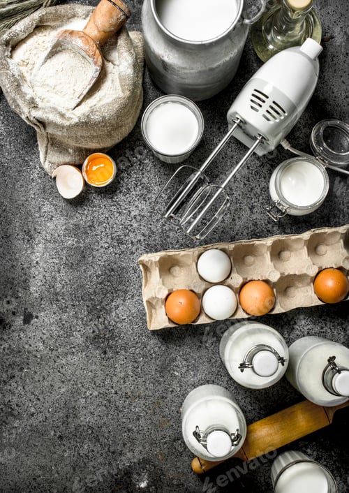 Preview: Baking background. Milk, flour and other ingredients for the dough.