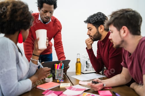 Preview: Manager leading a brainstorming meeting.