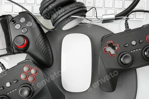 Preview: Flat lay composition with computer mouse and gaming gear on table