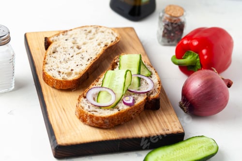 Vegetarian Open Sandwich on a Wooden Cutting Board